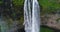 Iceland Aerial drone video of waterfall Seljalandsfoss in Icelandic nature