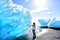 Iceland Amazing landscape at Iceberg beach. Tourist by icebergs on Ice beach, Breidamerkursandur aka Diamond Beach by