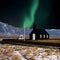Iceland black church with aurora borealis Northern Light in winter at night