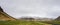 Iceland green landscape moss with mountain and clody sky scene