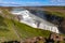 Iceland, Gullfoss waterfall. Captivating scene with rainbow of Gullfoss waterfall that is most powerful waterfall in Iceland and E