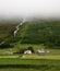 Iceland,houses and waterfall