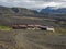 ICELAND, LANDMANNALAUGAR, August 1, 2019: Botnar mountain hut and campsite on Laugavegur hiking trail, green valley in