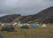 Iceland, Landmannalaugar , July 30, 2019: view on landmannalaugar camp site with cars, tents, tourists and hikers