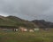 Iceland, Landmannalaugar , July 30, 2019: view on landmannalaugar camp site with cars, tents, tourists and hikers