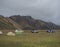 Iceland, Landmannalaugar , July 30, 2019: view on landmannalaugar camp site with cars, tents, tourists and hikers