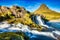 Iceland Landscape Summer Panorama, Kirkjufell Mountain during a Sunny Day with Waterfall in Beautiful Light