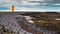 Iceland - Lighthouse on the Rocky Shore - Strandakirkja