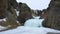 Iceland. Nature, Arctic nature winter landscape. Frozen waterfall. Blue ice. Magical nature winter location with pure