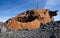 Iceland. Reykjanes Peninsula. Rusted vessel and volcanic ground.