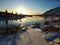 Iceland`s breathtaking winter landscapes. River with pieces of ice on the background of mountains