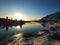 Iceland`s breathtaking winter landscapes. River with pieces of ice on the background of mountains