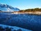 Iceland`s breathtaking winter landscapes. River with pieces of ice on the background of mountains