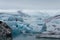 Iceland`s glacier Jokulsarlon through the breakaway icebergs