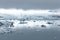 Iceland`s glacier Jokulsarlon through the breakaway icebergs