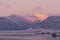 Iceland scene with snow mountain and sunrise and reflexion on fr