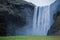 Iceland Skogafoss Waterfall Landscape with Mountain Moss on the Ground. Long Exposure