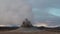 Iceland. Smoke above the earth. Global warming and climate change. Steam from the fumarole. Dramatic sky. Volcano