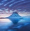 Iceland snaefellsnes peninsula and famous Kirkjufell. Kirkjufell is a beautifully shaped and a symmetric, free standing mountain.