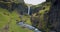 Iceland spectacular Kvernufoss waterfall Summer scene of mountain river in secluded green ravine Beauty of nature