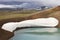 Iceland. Stora-Viti crater with water. Slope with snow.