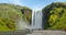 ICELAND TIMELAPSE LOOP VIDEO: Iceland waterfall Skogafoss in Icelandic nature landscape - Video Timelapse