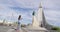 Iceland tourist taking photograph of Hallgrimskirkja church in Reykjavik