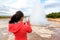 Iceland tourist taking photos of geyser Strokkur