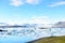 Iceland travel tourist enjoying view of nature landscape Jokulsarlon glacial lagoon / glacer lake on Iceland. Woman