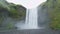 Iceland Waterfall Skogafoss in Beautiful Icelandic Landscape