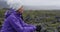 Iceland - Woman hiker outdoors on hike resting - Tourist hiker enjoying view
