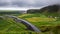 Icelandic farm houses in the middle of a green countryside plain. Skogar, Iceland