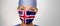 Icelandic flag Iceland COVID-19 panoramic banner Corona virus outbreak pandemic doctor woman wearing PPE protective face