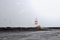 Icelandic Gardur Lighthouse with flying birds