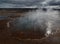 Icelandic geysir in a scenic view of the landscape