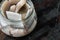 Icelandic herring, in glass jar, on old dark  wooden table background., with copyspace  and space for text