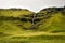 Icelandic landscape, endless spaces of greenery, mountains and w