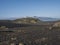 Icelandic landscape with eyjafjallajokull glacier tongue, blue river stream and green hills. Fjallabak Nature Reserve, Iceland.