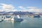 Icelandic mountain lake and glacier under the sun