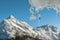 Icicle and distant mountain, New Zealand.