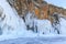 Icicles background on the ice wall on Baikal lake at winter