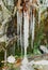 Icicles below a waterfall