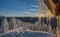 Icicles Fall From Roof at Sunrise in Cascade Mountains