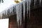 Icicles hanging from barn roof in South Germany.