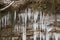 Icicles on a rocky hill