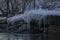 Icicles And Snow On Rocks