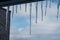 Icicles on a window on a winter day