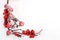 Icing pine branch and branch with red rowanberries and gift box with snowflakes and christmas trees and reindeerw and red matt bow