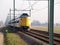 ICM koploper intercity train at the railroad track at Moordrecht heading to station of Gouda