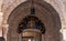 Icon decorated for the celebration of Christmas over the side entrance on the territory of the Church of Nativity in Bethlehem in